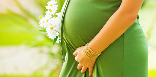 Pregnant Woman in Green via cvrcak1/Flickr