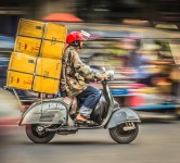 delivery motorcycle on demand packages parcels traffic