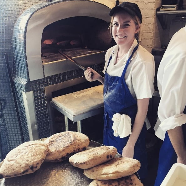 Baking Israeli pita bread at Shaya's. Courtesy
