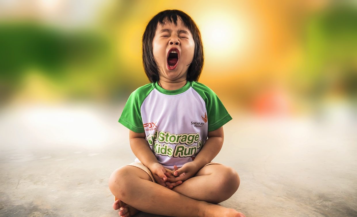 A child yawning via Pixabay