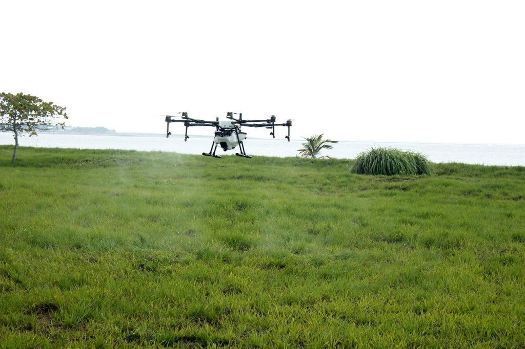 A drone spraying a field. Pixabay