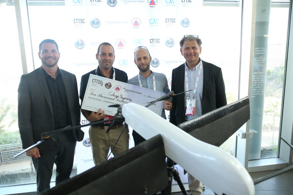 The Colugo team with Adam Tarsi, far left, and Gideon Miller, far right, at Cyber week 2018. Photo by Dror Sithakol
