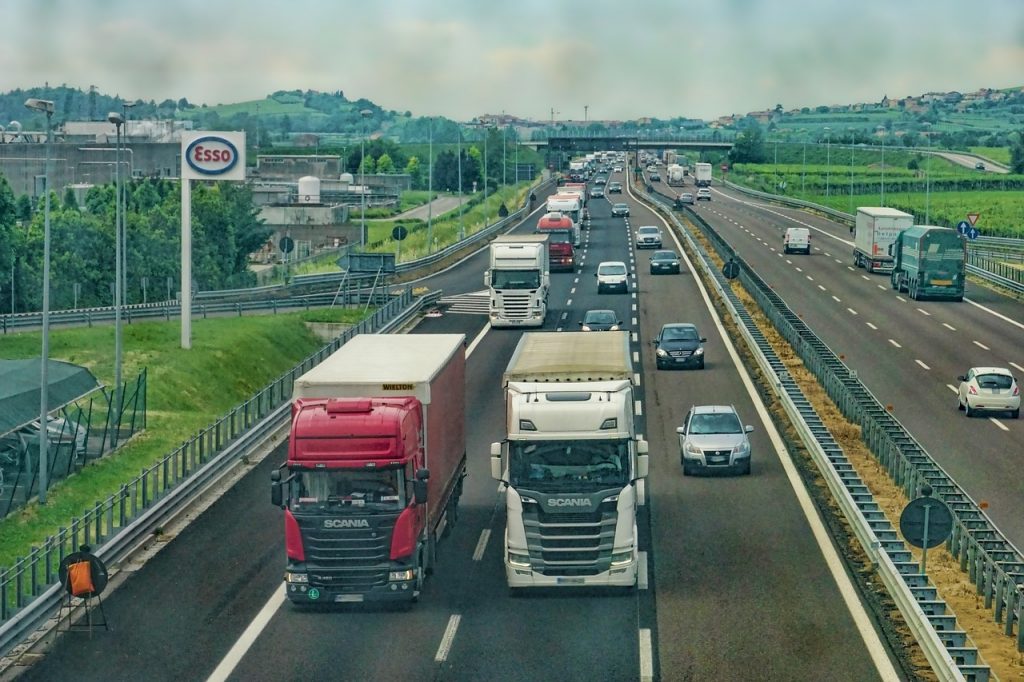 Trucks on the highway. Photo via Pixabay