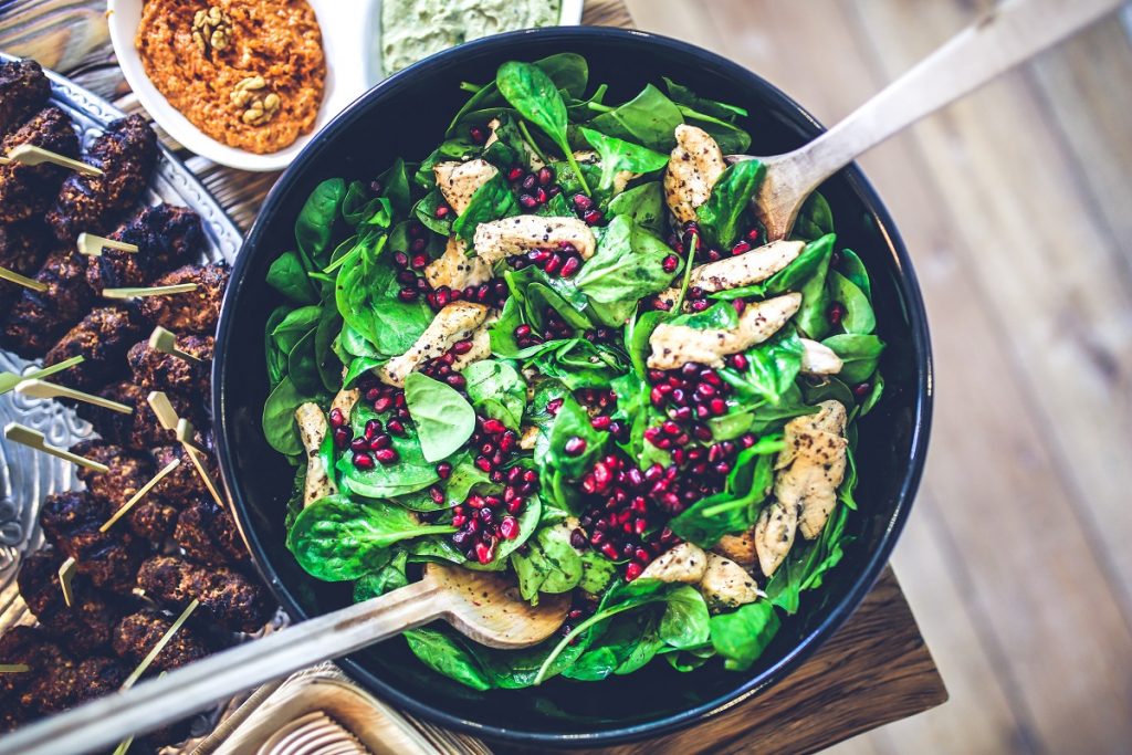 A pomegranate and chicken salad. Photo via Pexels