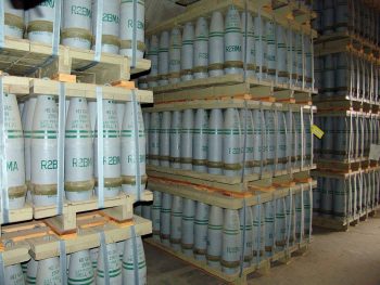 Pallets of 155 mm artillery shells containing 'HD' (distilled sulfur mustard agent) in a chemical weapons storage facility in Colorado. Photo via the US government on Wikimedia