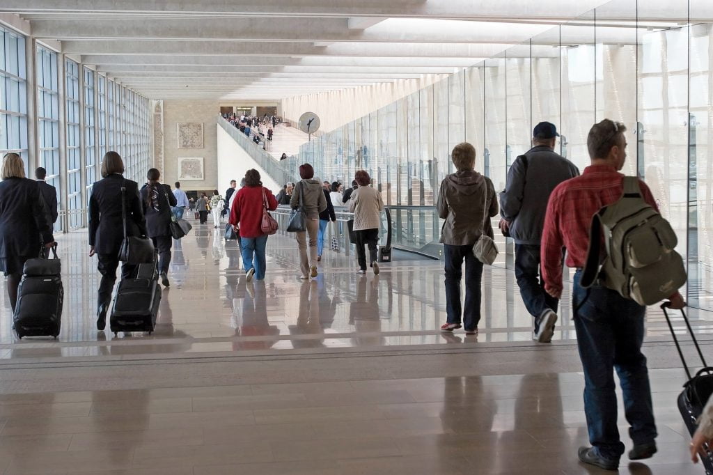 Passengers at Ben Gurion Airport. Deposit Photos