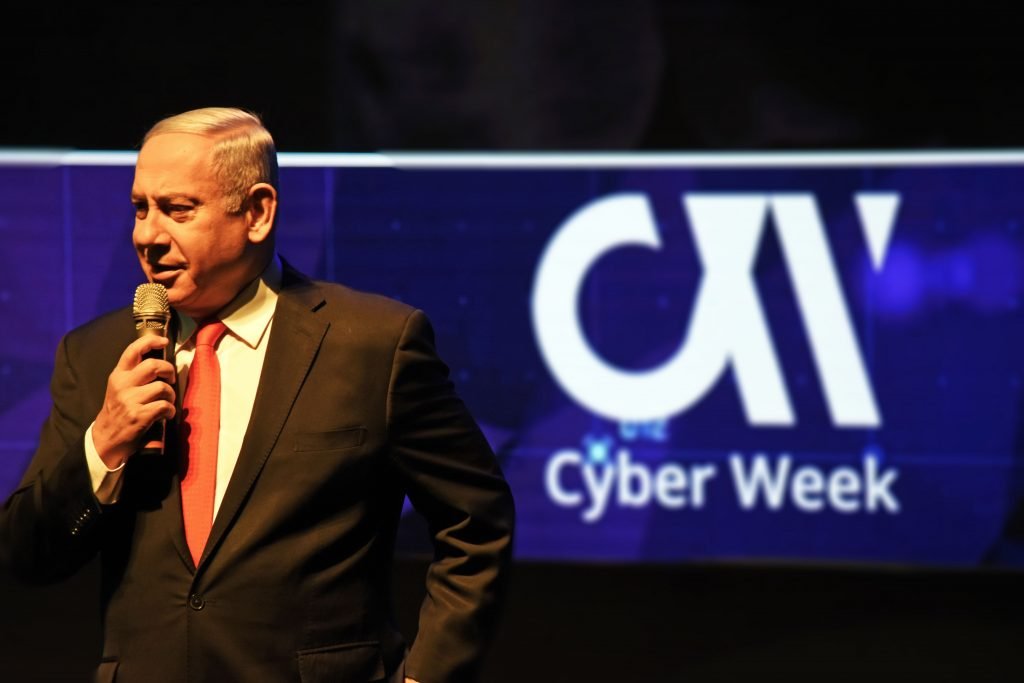 Prime Minister Benjamin Netanyahu speaks at the 9th annual Cyber Week conference in Tel Aviv, June 26, 2019. Photo by Anjali Berdia