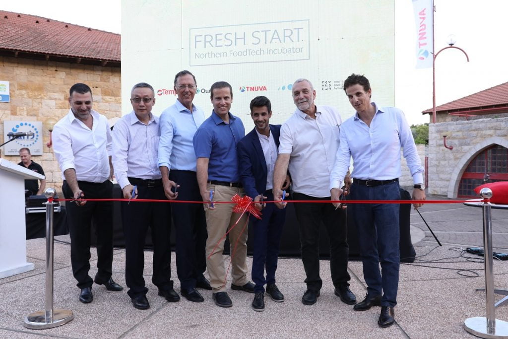 Members of the "Fresh Start" consortium launch the incubator in Kiryat Shmona. Courtesy