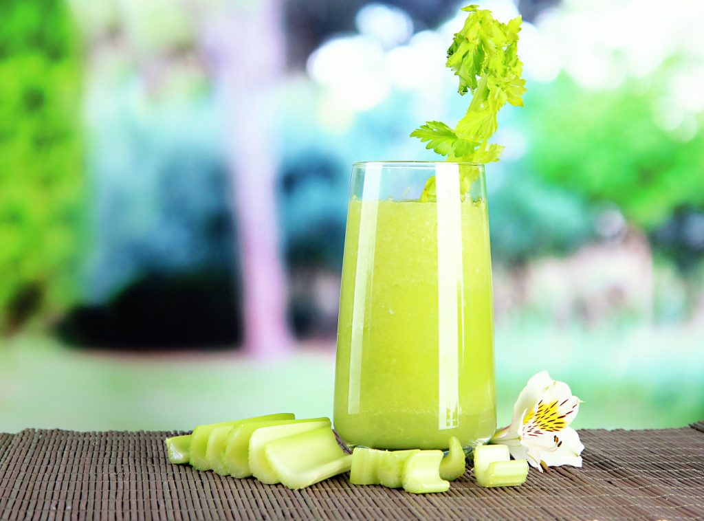 Glass of celery juice. Deposit Photos