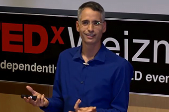 Professor Ron Milo at a Tedx Talk. Screenshot