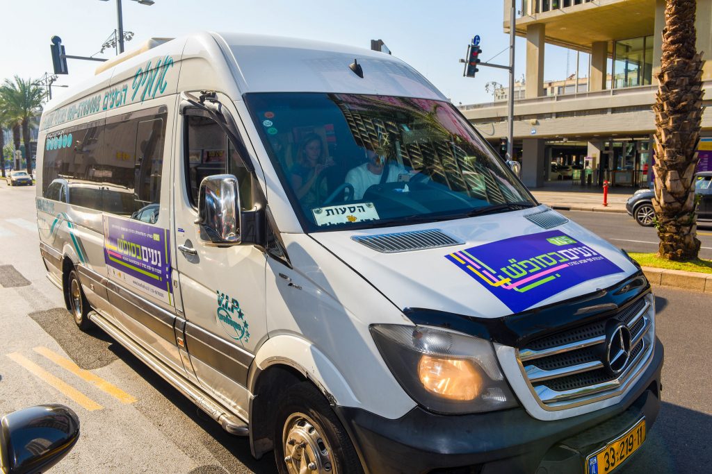 A vehicle transports riders in Tel Aviv on Shabbat as part of the municipality's public transport on weekends initiative. Photo by Kfir Sivan via the Tel Aviv Municipality's Flickr page