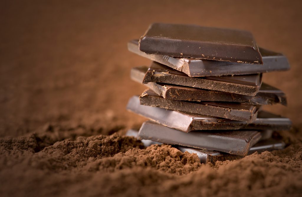 Stacked chocolate bars. Illustrative. Deposit Photos