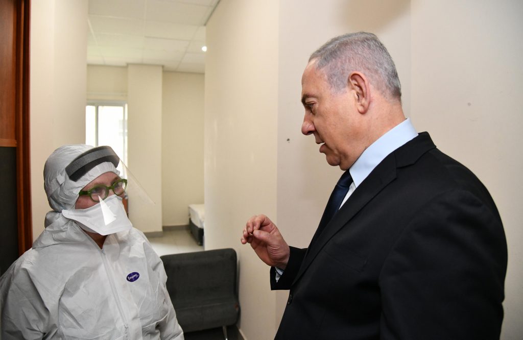 Prime Minister Benjamin Netanyahu at Sheba Medical Center as the hospital prepares to care for 11 Israelis back from a coronavirus-stricken cruise ship. Photo: Haim Zach / GPO