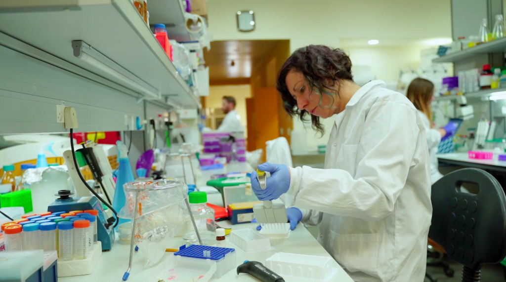 A scientist at the Migal Research Institute's lab where researchers are working on developing a coronavirus vaccine. March 2020. Courtesy