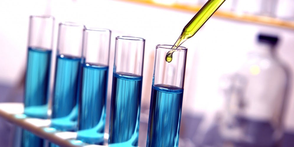 lab test tubes blue via Bigstock
