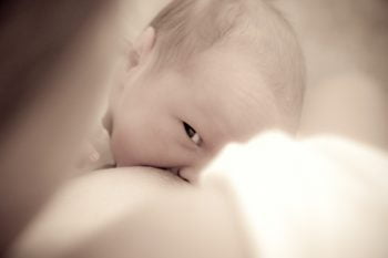 Breastfeeding a Baby via Aurimas Mikalauskas/Flickr