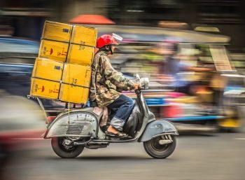 delivery motorcycle on demand packages parcels traffic voa Flickr