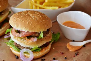 An illustrative photo of a hamburger and fries. Credit Pixabay