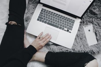 Woman on laptop. Photo by Mikayla Mallek on Unsplash