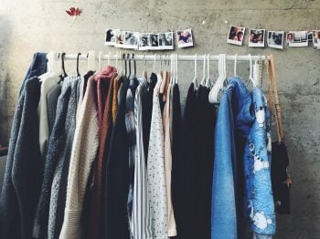 Clothes on a rack. Photo via Unsplash