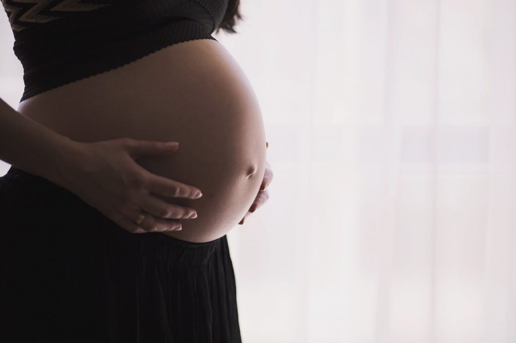 An illustrative photo of a pregnant woman. Pixabay