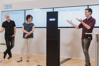 Noam Slonim, far left, and Dr. Ranit Aharonov, center, from IBM's research lab in Haifa with Israeli debate champion Yaar Bach. Photo by Or Kaplan