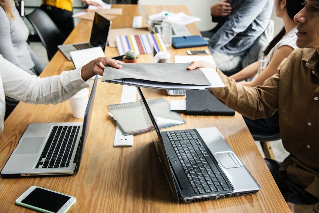 An illustrative photo of people working. Photo via Pexels