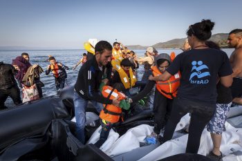 IsraAID's team provides immediate care for refugees as their boat lands on shore of Lesbos. Photo by Boaz Arad/IsraAID