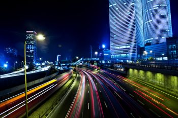 The Tel Aviv skyline at night. Photo via Deposit Photos