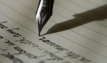 An illustrative photo of handwriting with a fountain pen. Photo via Pixabay