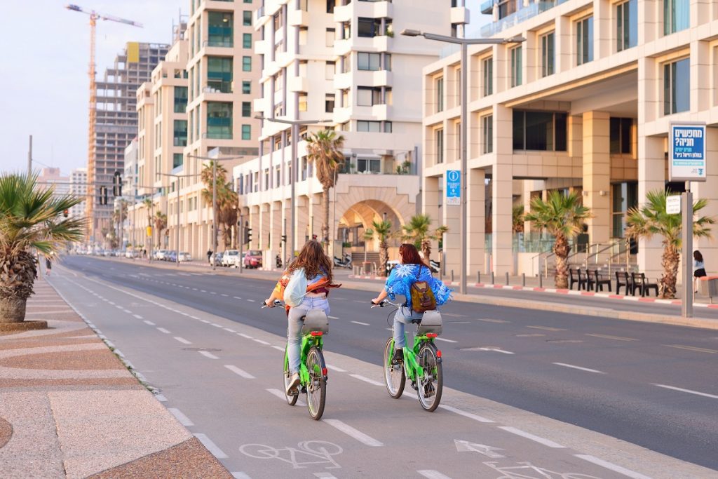 Herbert Samuel st. bike track and walking area for pedestrians in the center of Tel Aviv. Deposit Photos