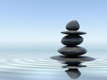 An illustrative photo of zen stones in water. Deposit Photos