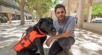 Yoav Golan, PhD student at BGU with his dog Tai. Courtesy