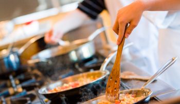 An illustrative photo of a cooking class. Deposit Photos