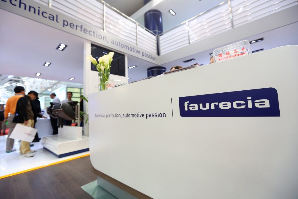 A Faurecia stand at the 15th Shanghai International Automobile Industry Exhibition in 2013. Deposit Photos
