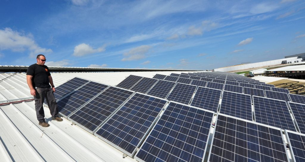 Solar panels installed on a roof by Israeli engineers. Deposit Photos