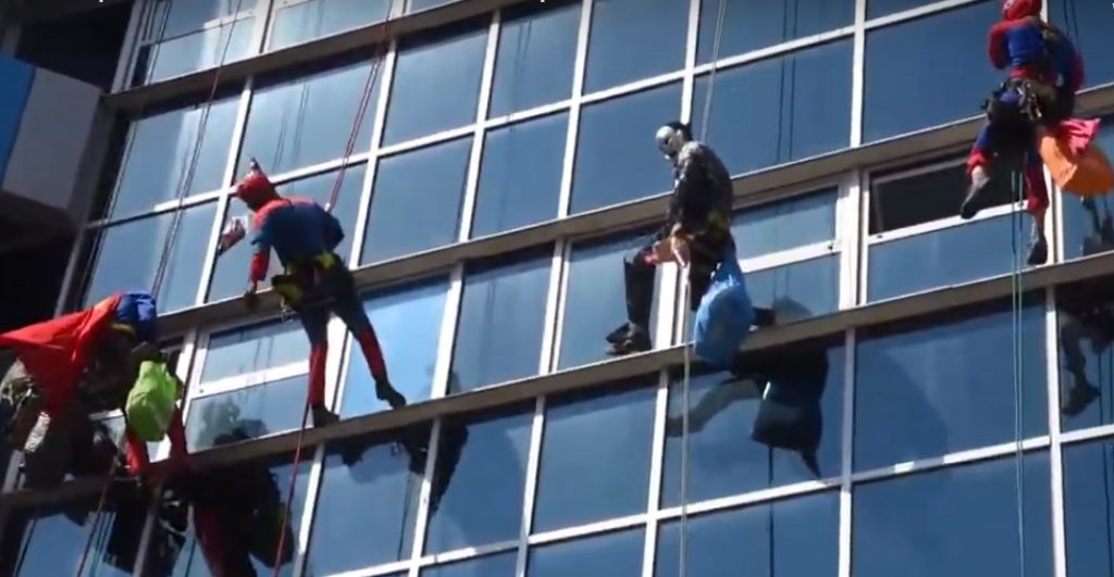 Volunteers dressed as superheroes hand out treats and toys at Ichilov's Children's Hospital in Tel Aviv. Screenshot