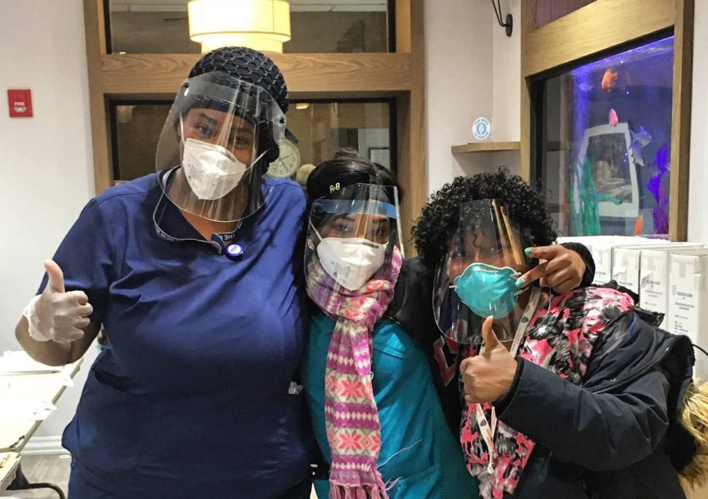 In NYC, Tikkun Olam Makers partnered with local makerspace Skill Mill NYC to manufacture and deliver hundreds of face shields to nursing homes, rehab centers, fertility clinics and hospitals around the city. In the picture - Nurses from the New Jewish Home (Senior Citizen home) in Manhattan with Face Shields supplied by TOM:NYC.