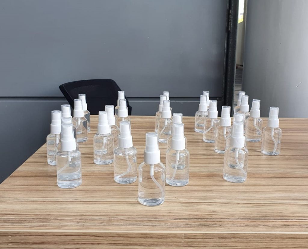 These small spray bottles contain the tap water-based disinfectant solution developed by Bar Ilan University scientists. Photo: NoCamels staff 