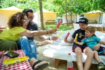A family at a glamping site in Kfar Blum in the norther Galilee. Photo: Gilad Sasson