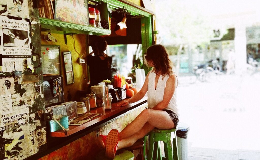 Tel Aviv cafe booth. Illustrative. Photo: Avi Naim on Unsplash