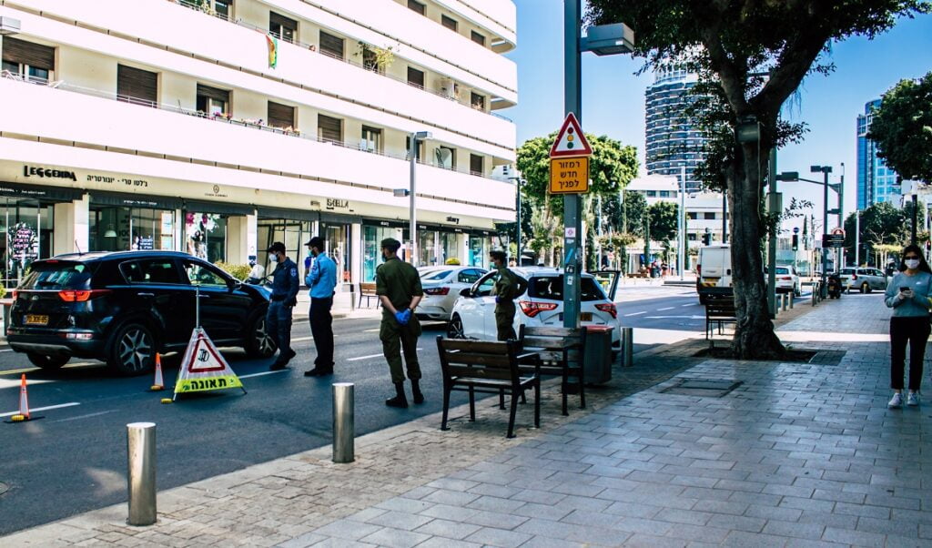 Israeli police set up a roadblock during the first coronavirus lockdown in March and April 2020. Deposit Photos