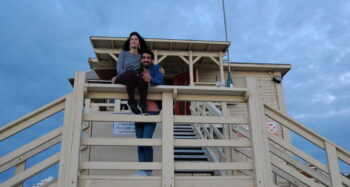 Dana Moison enjoys a date with husband Uri Pozniansky at a lifeguard tower on Bograshov Beach. Courtesy