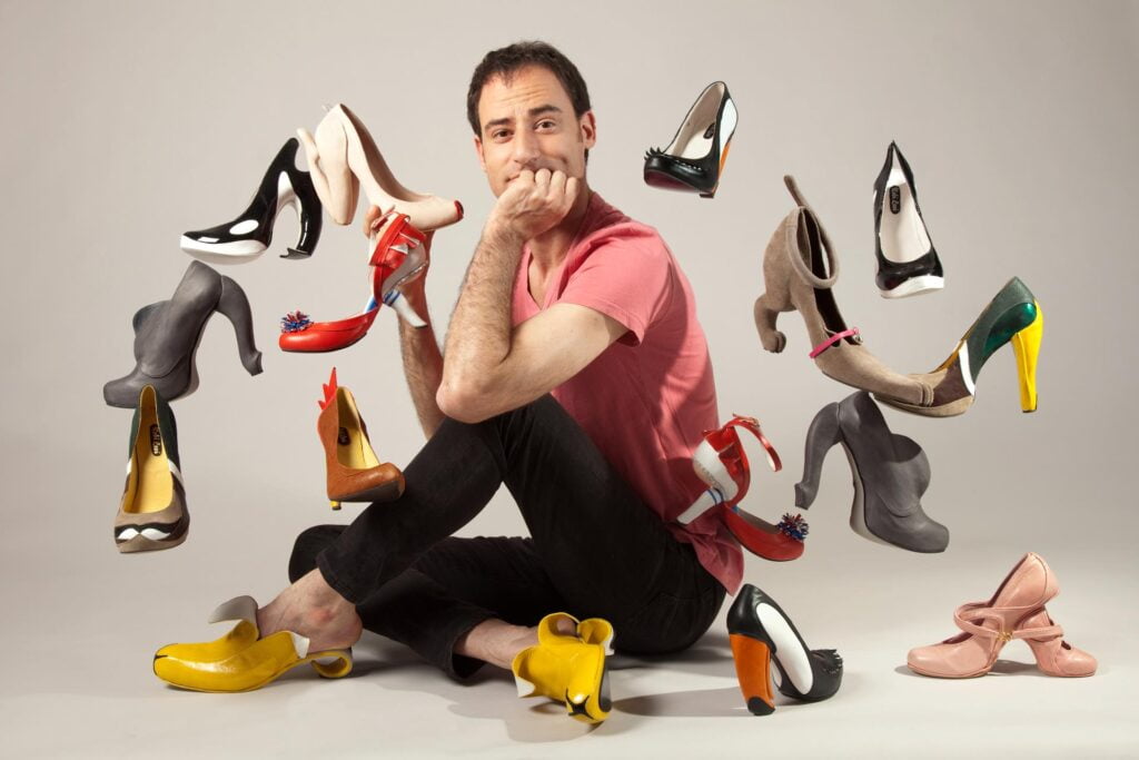Israeli designer Kobi Levi with his shoes