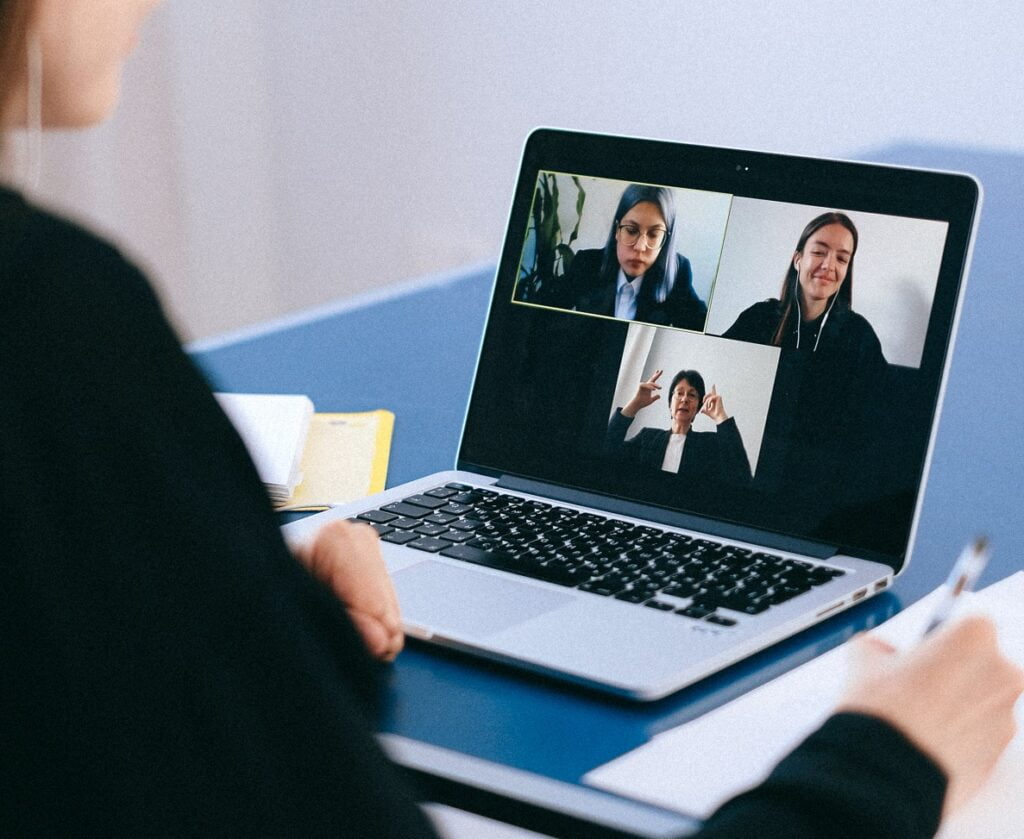 An illustrative photo of a Zoom meeting.  Photo by Anna Shvets from Pexels