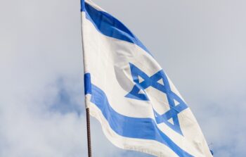An Israeli flag. Photo by: Oleg Vakhromov on Unsplash