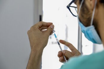 A nurse set to administer a COVID-19 vaccine in Tel Aviv, February 2021. Photo: Guy Yechiely/ Tel Aviv Municipality