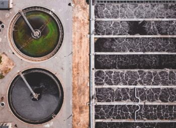 An illustrative photo of a water treatment plant. Photo by Ivan Bandura on Unsplash