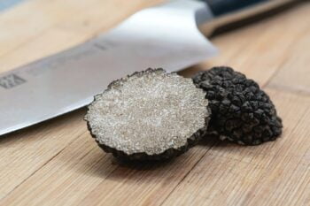 A black truffle. Illustrative. Photo by amirali mirhashemian on Unsplash.