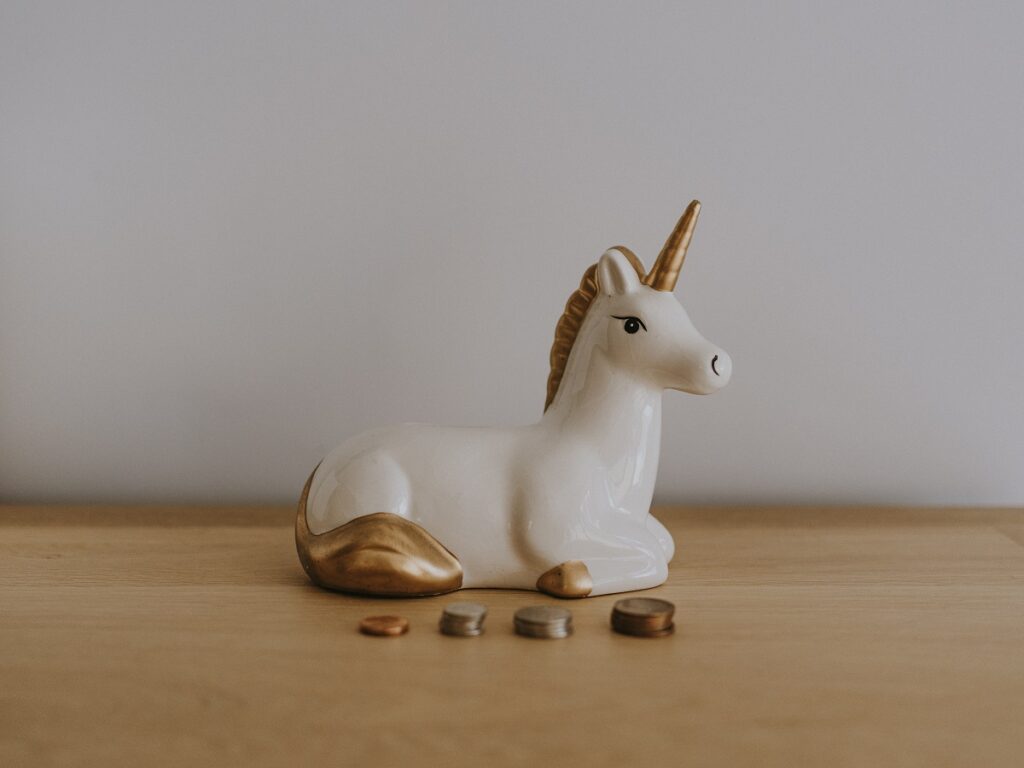 A unicorn figurine. Photo by Annie Spratt on Unsplash